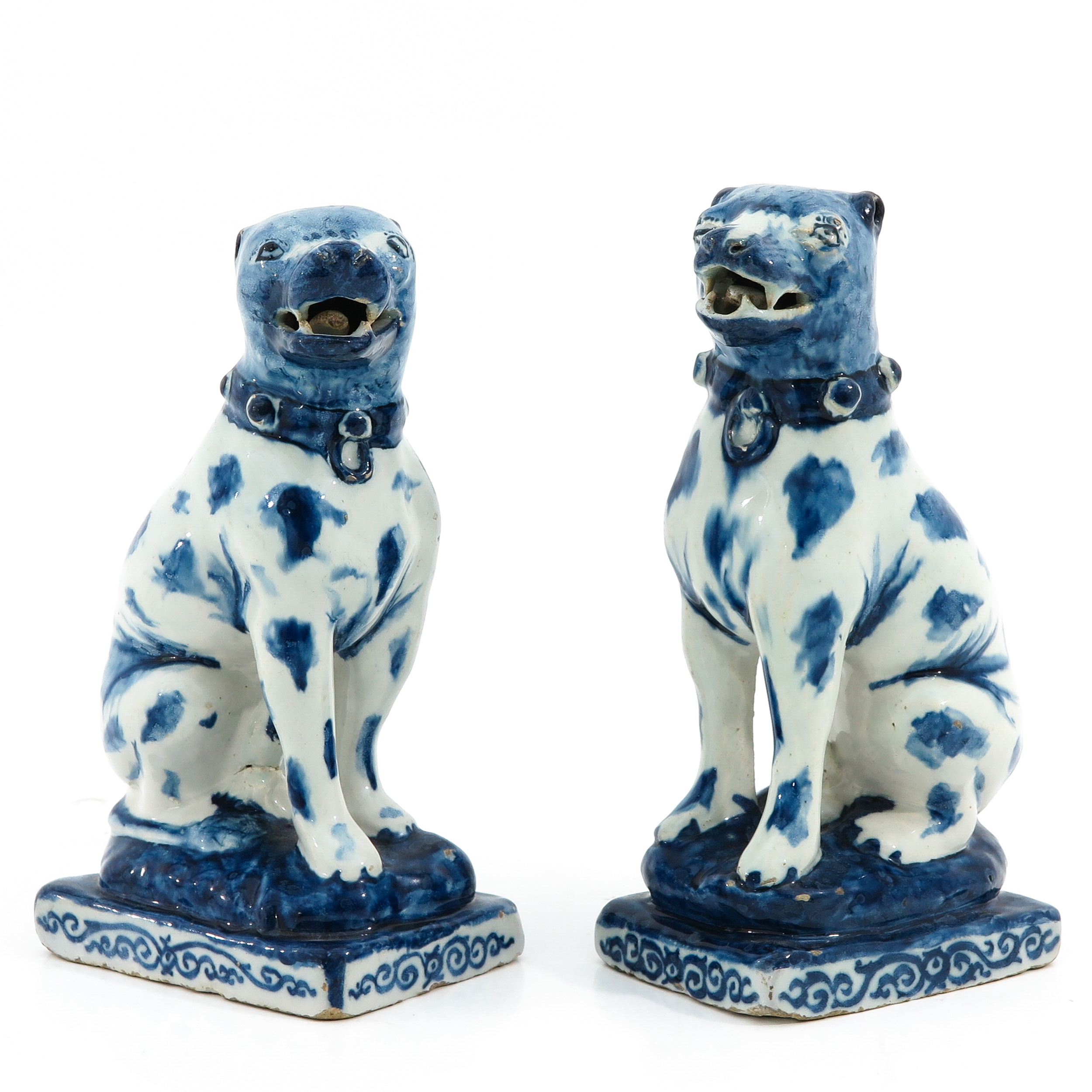 A Pair of 18th Century Delft Dogs